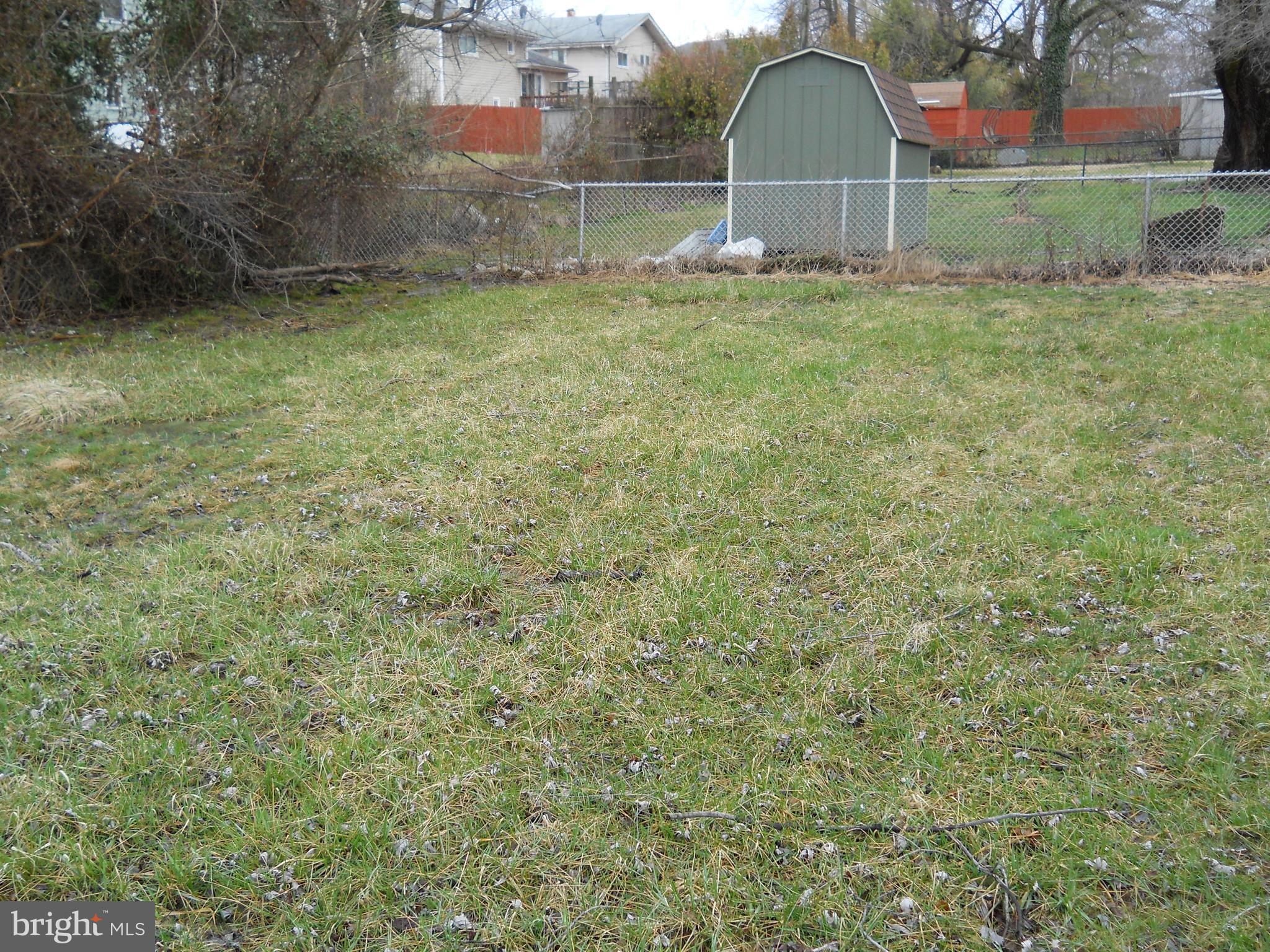 7415 Remoor Road Baltimore, MD 21207 - Photo 9 of 45 a backyard of a house with lots of green space
