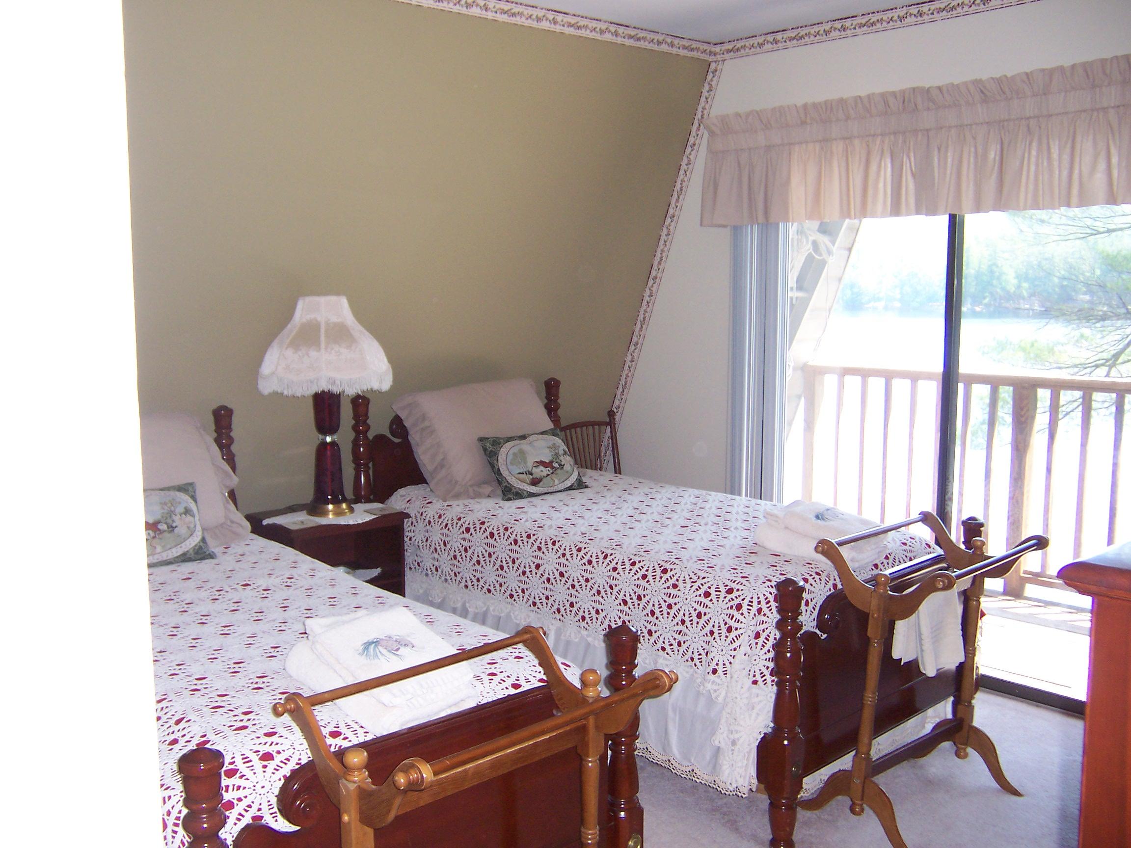 34 Vienna Shores Road Vienna, ME 04360 - Photo 27 of 35 2ne bed with view