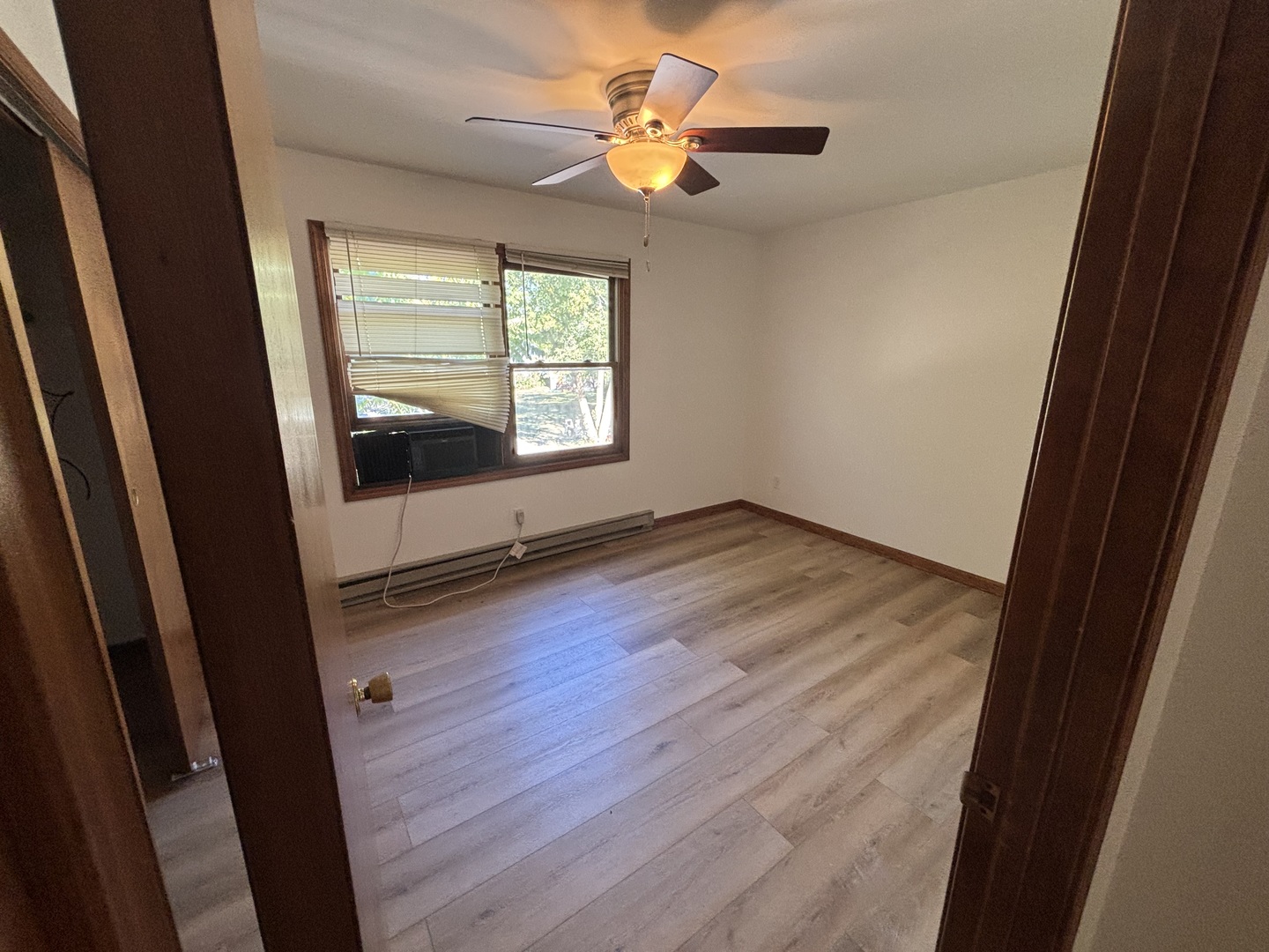 322 West Railroad Street, Unit 3 Marengo, IL 60152 - Photo 22 of 26 a view of an empty room with a window