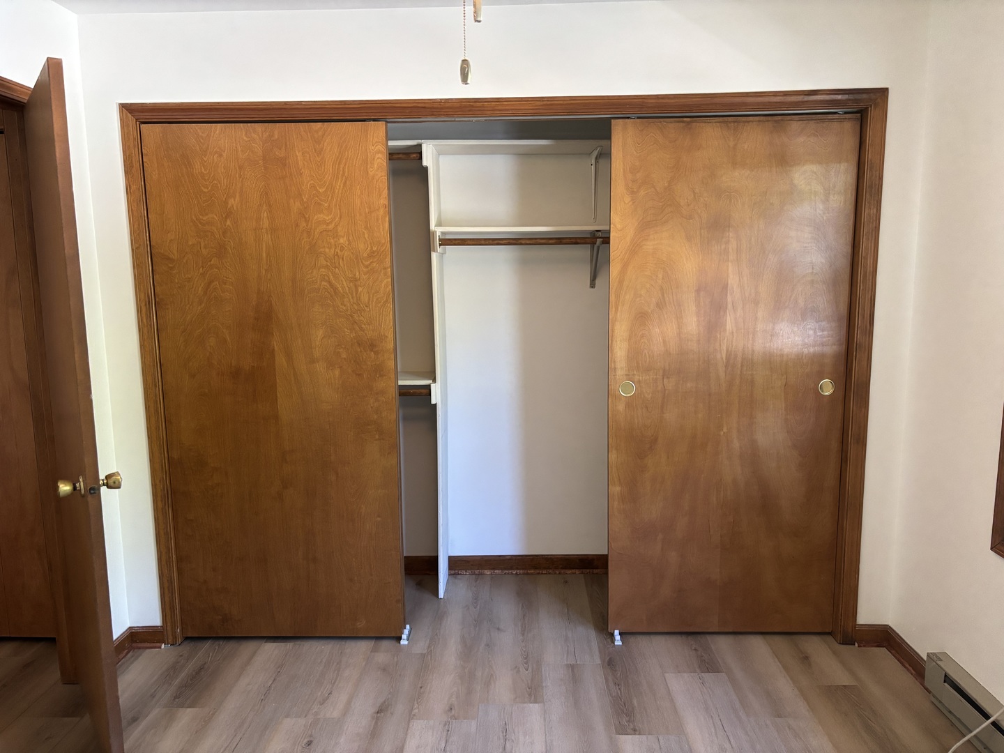 322 West Railroad Street, Unit 3 Marengo, IL 60152 - Photo 24 of 26 a view of an empty room with wooden floor