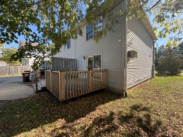 322 West Railroad Street, Unit 3 Marengo, IL 60152 - Photo 3 of 26 a view of a house with a yard