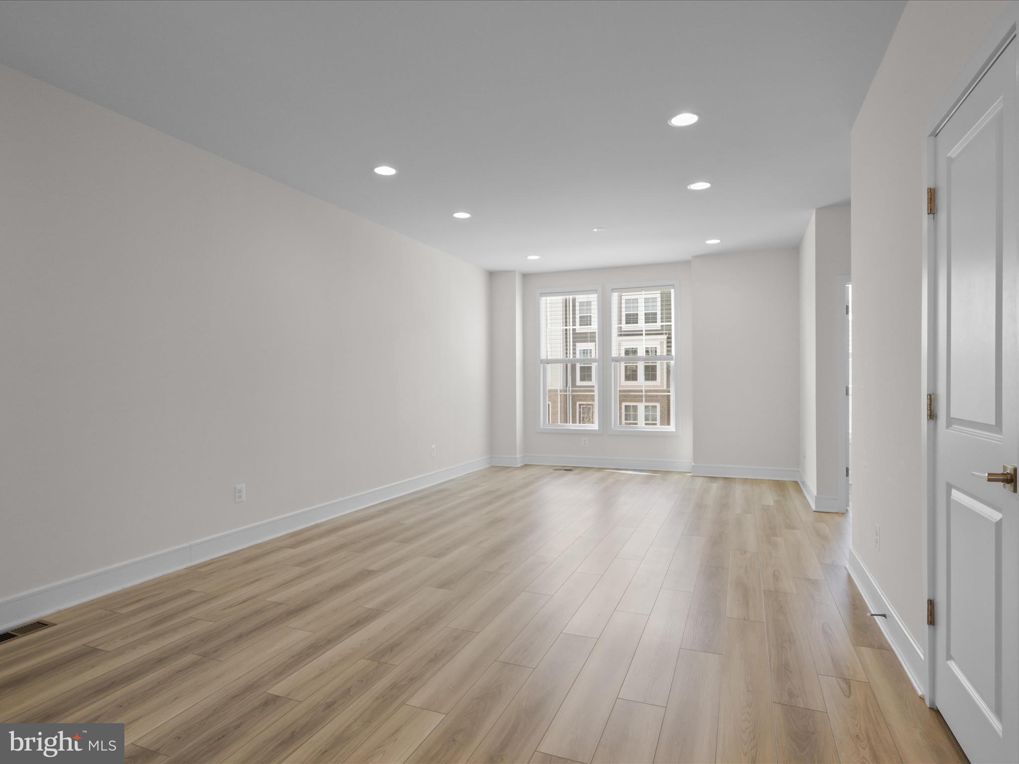 14564 Alsace Lane Gainesville, VA 20155 - Photo 16 of 44 wooden floor in an empty room with a window