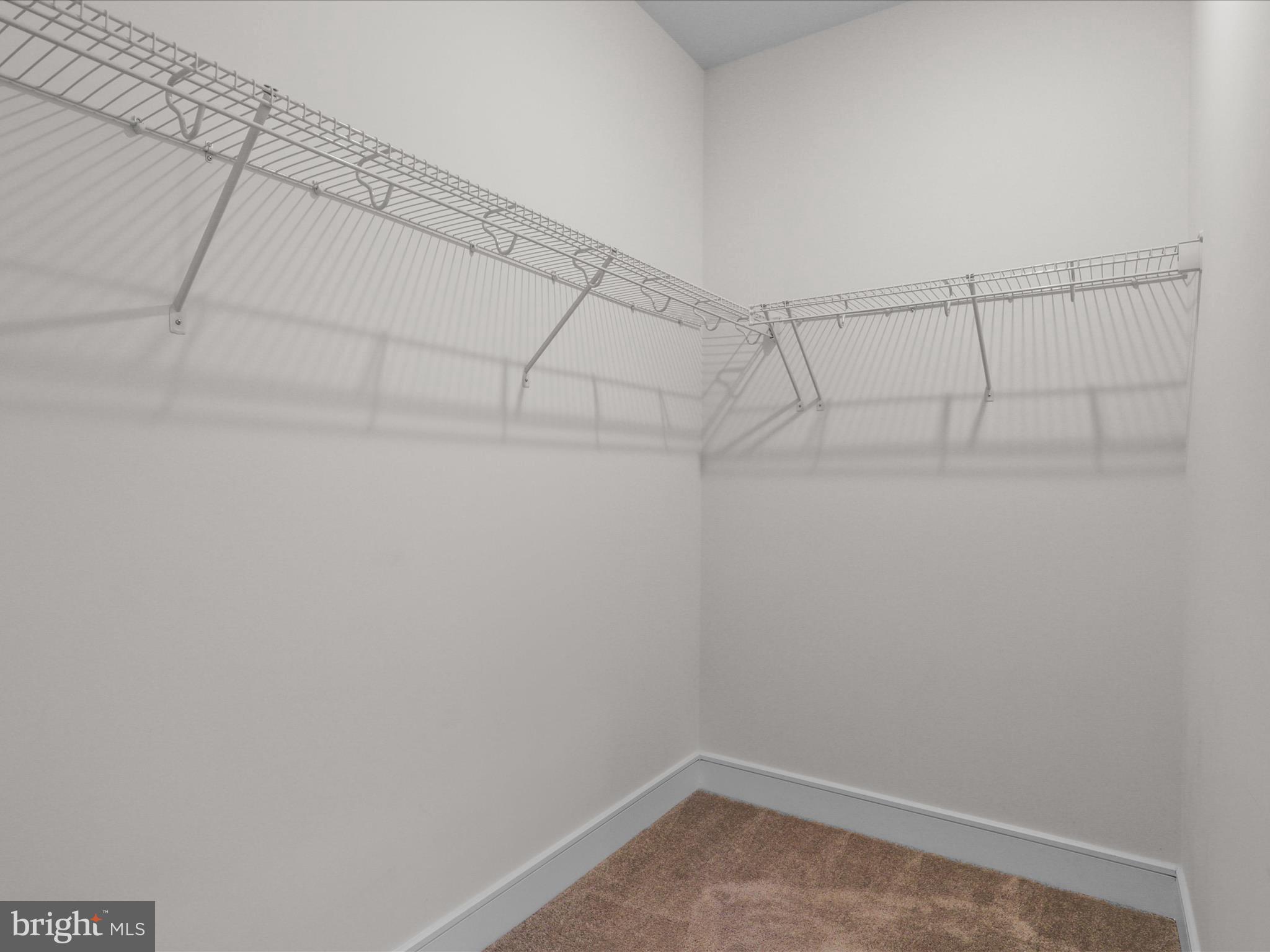 14564 Alsace Lane Gainesville, VA 20155 - Photo 23 of 44 a view of a room with racks on the wall