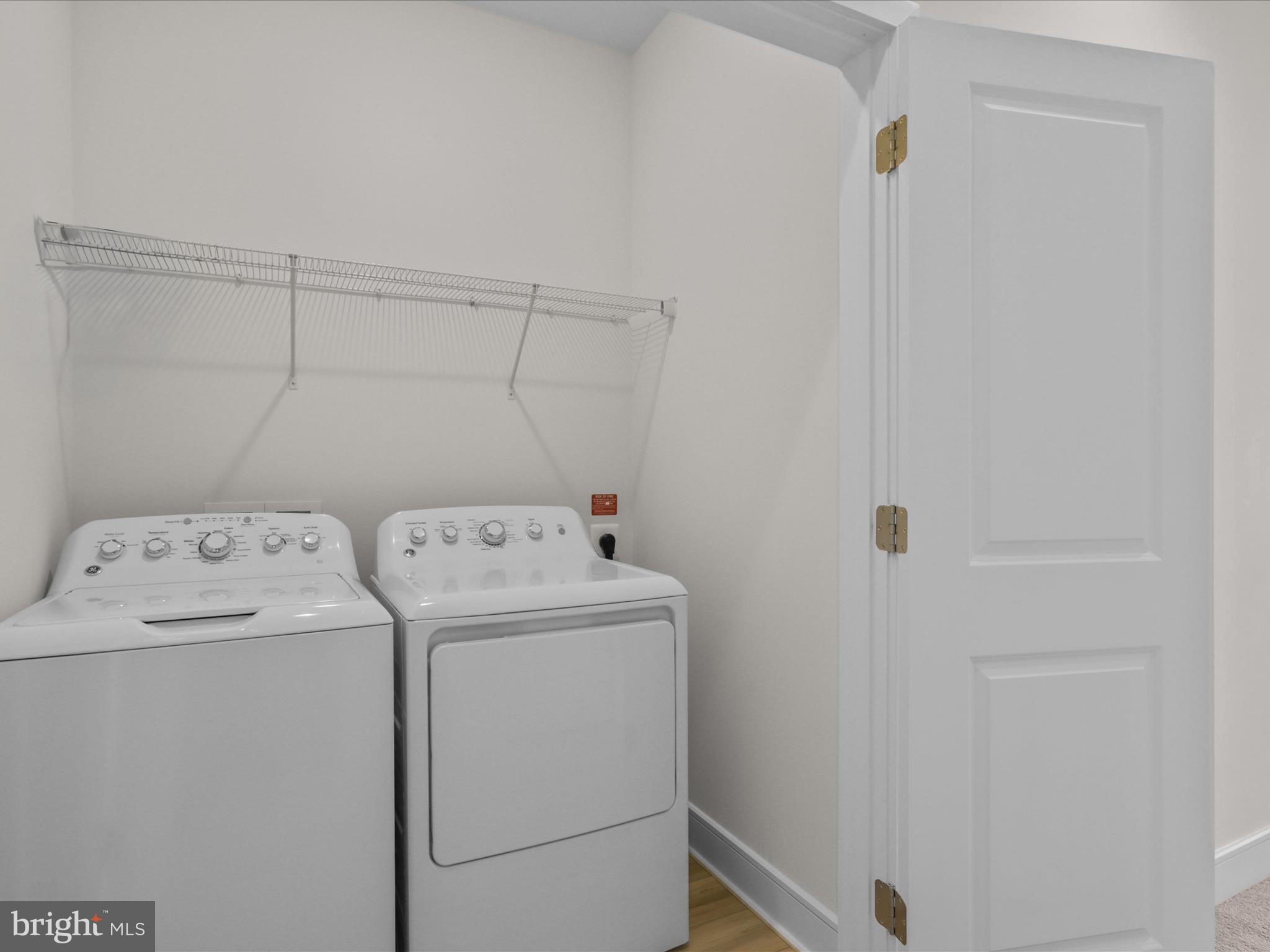 14564 Alsace Lane Gainesville, VA 20155 - Photo 24 of 44 a view of storage and utility room with washer and dryer