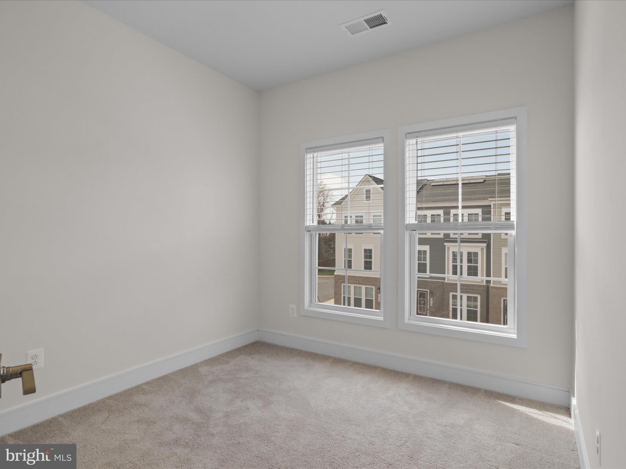 14564 Alsace Lane Gainesville, VA 20155 - Photo 27 of 44 an empty room with windows