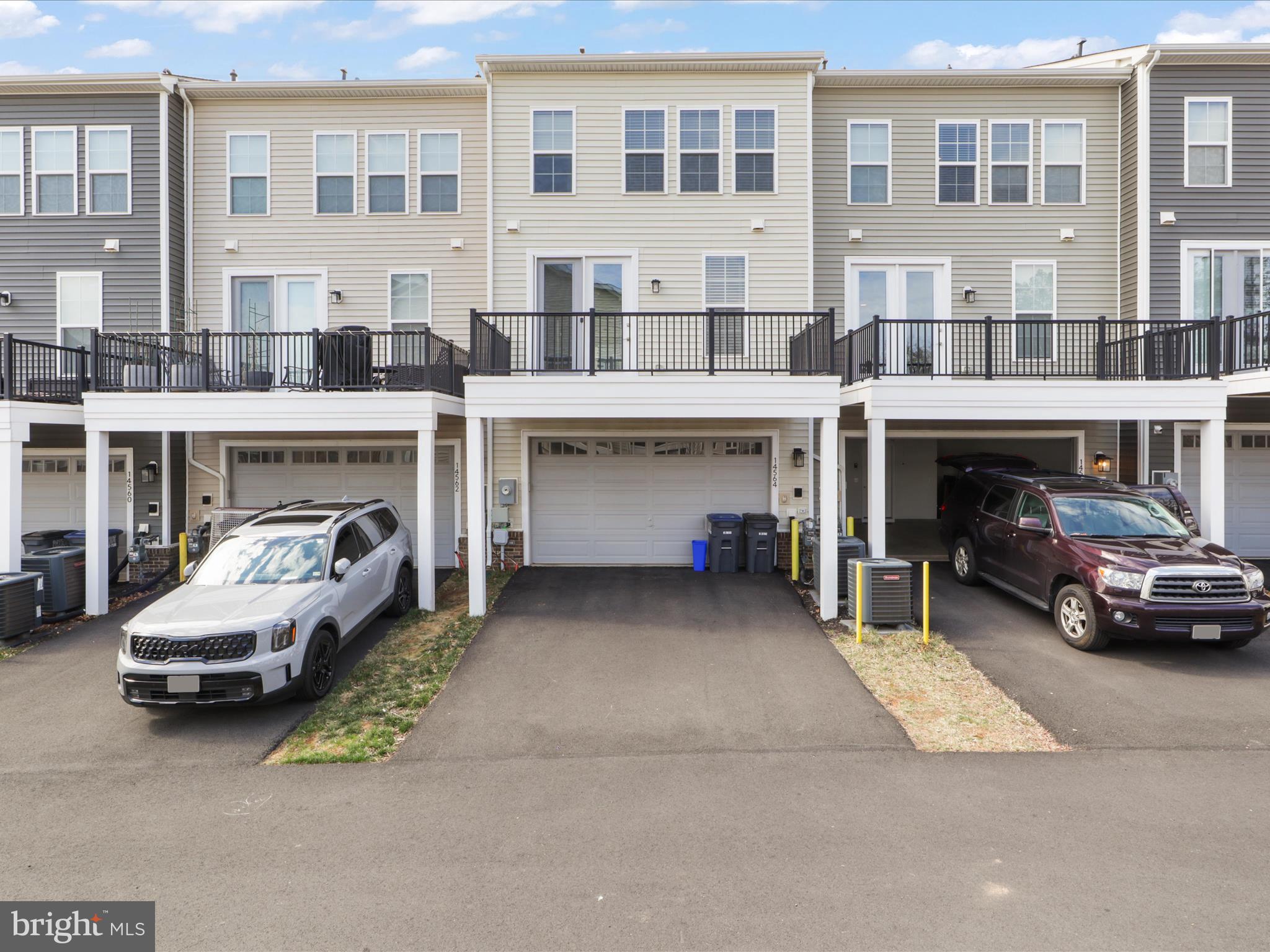 14564 Alsace Lane Gainesville, VA 20155 - Photo 31 of 44 a view of building with car parked