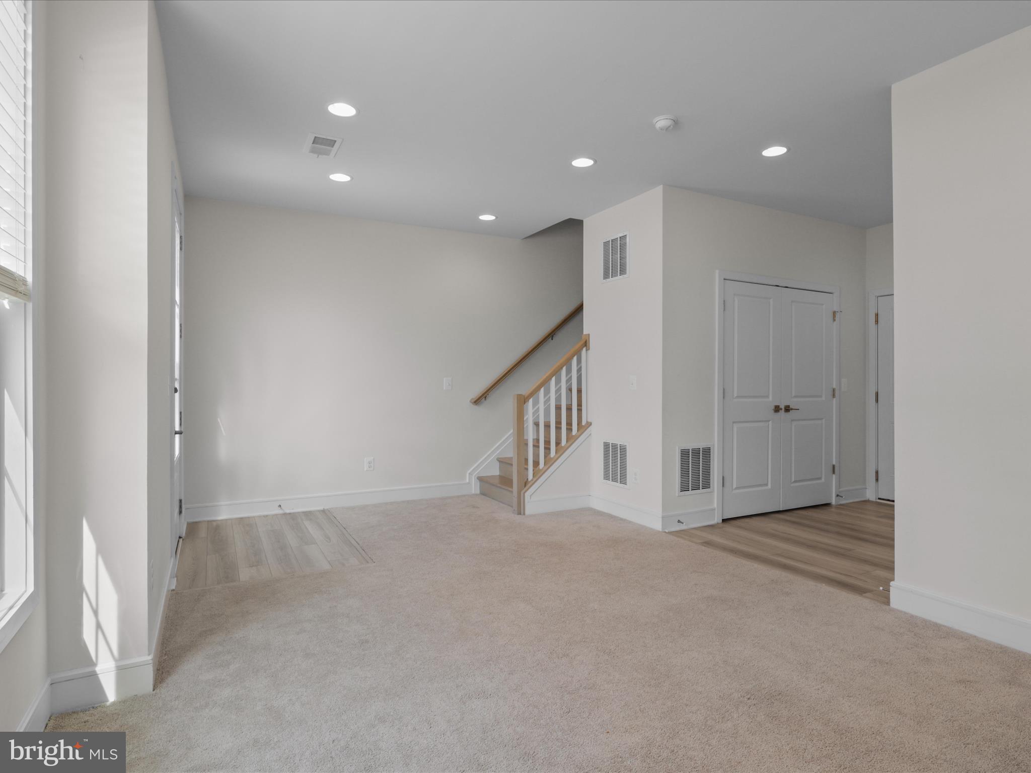 14564 Alsace Lane Gainesville, VA 20155 - Photo 7 of 44 a view of an empty room with stairs