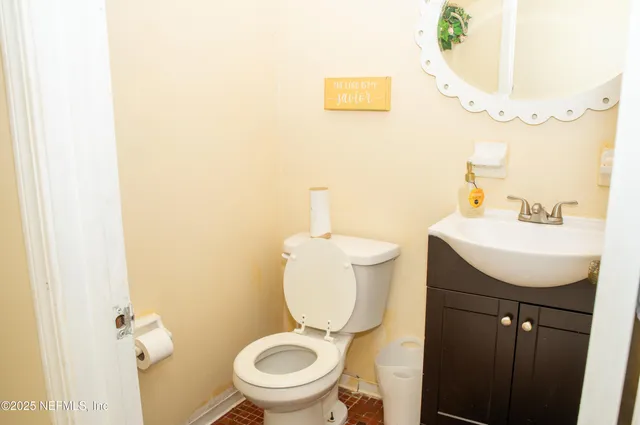a close view of utility room with washer and dryer