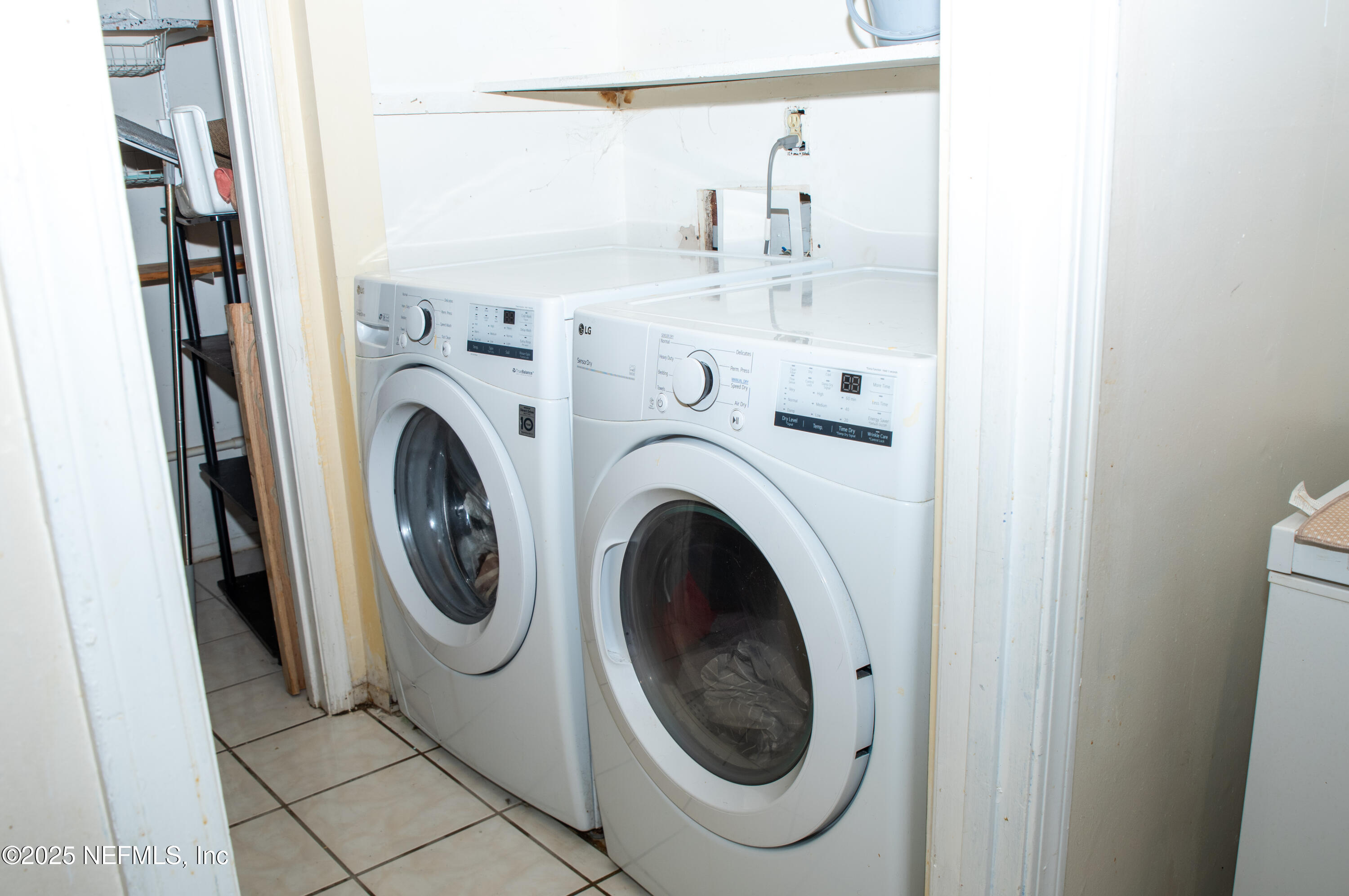 4822 Windrush Lane Jacksonville, FL 32217 - Photo 8 of 13 a close view of utility room with washer and dryer