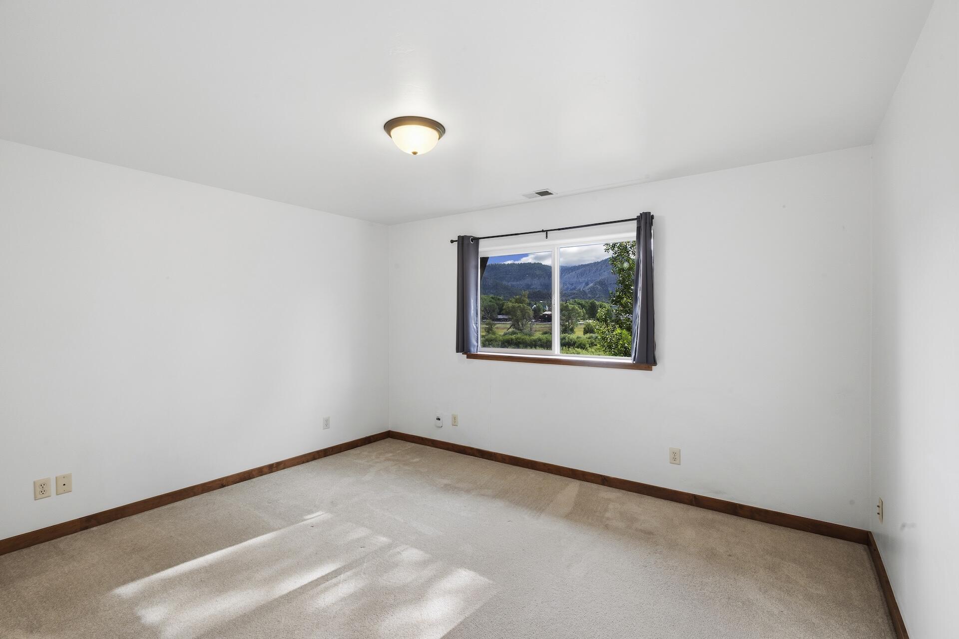 550 Redcliff Circle, Unit D204 Ridgway, CO 81432 - Photo 11 of 19 Bedroom 1