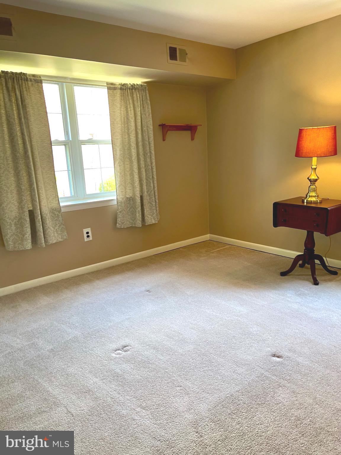 804 South Avenue, Unit D7 Secane, PA 19018 - Photo 18 of 35 a view of an empty room with a window