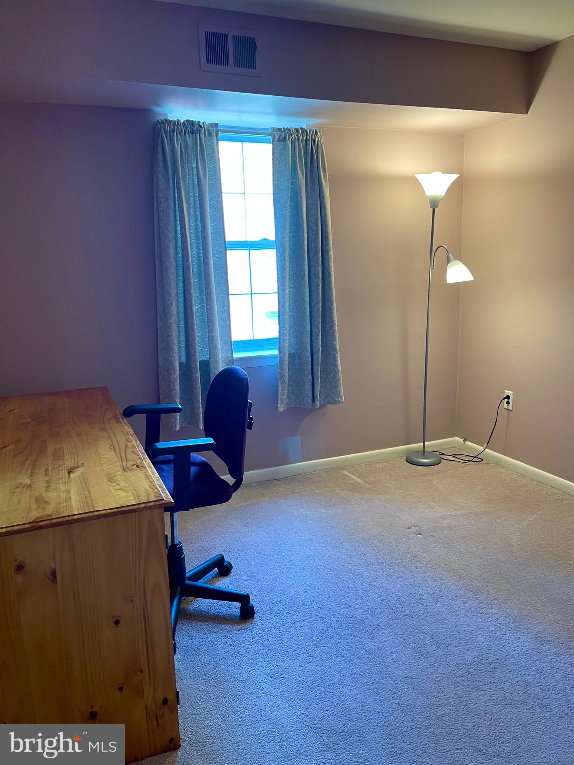 804 South Avenue, Unit D7 Secane, PA 19018 - Photo 23 of 33 a bedroom with a bed and window