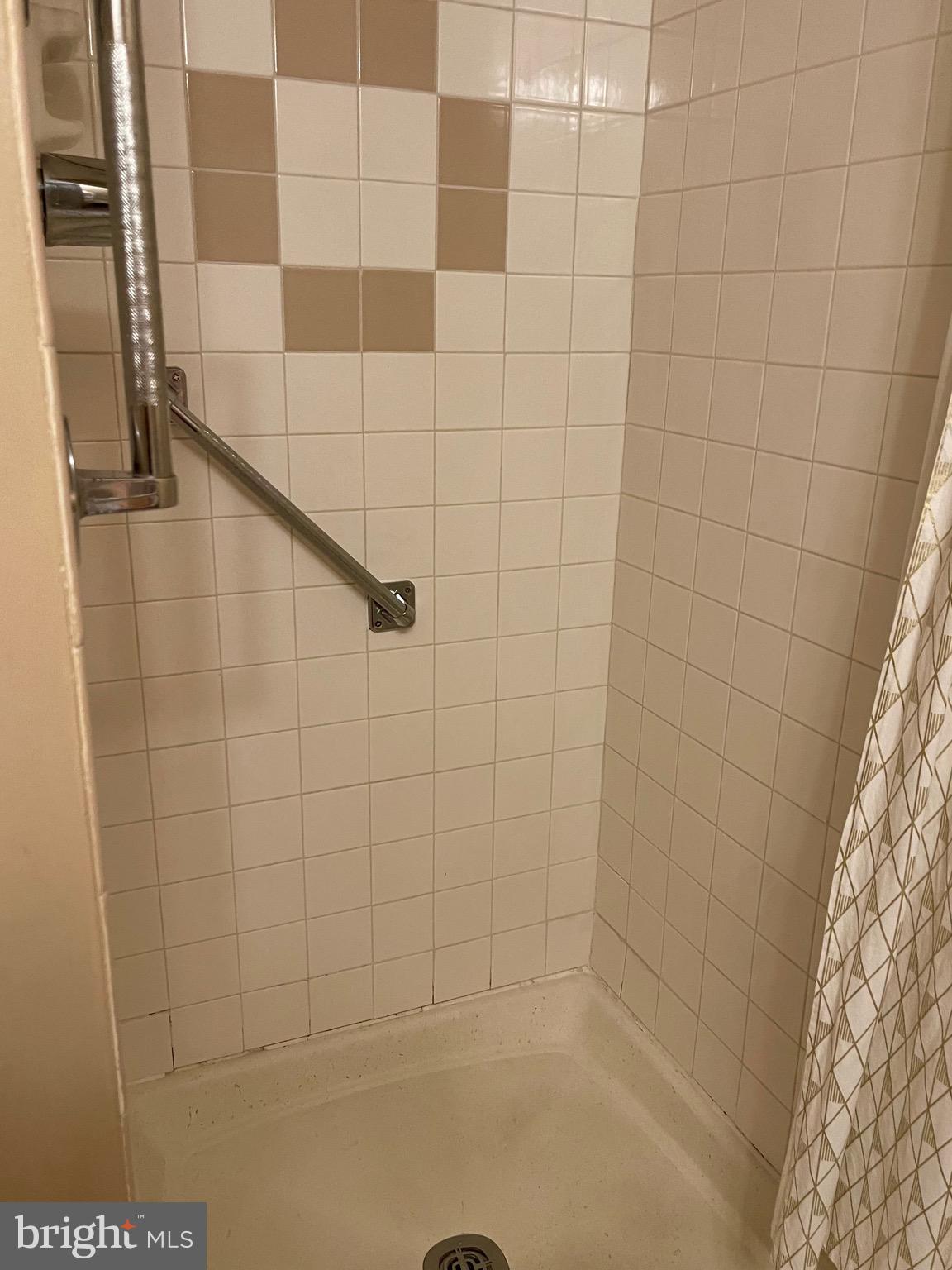 804 South Avenue, Unit D7 Secane, PA 19018 - Photo 23 of 35 a bathroom with a shower