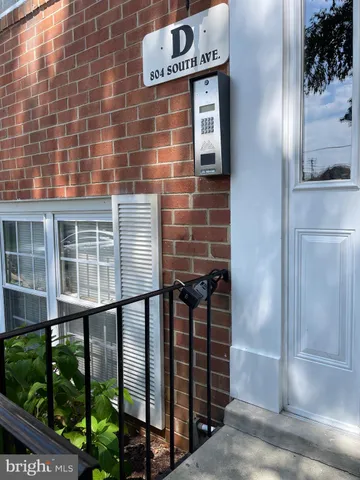a front view of a house with glass windows