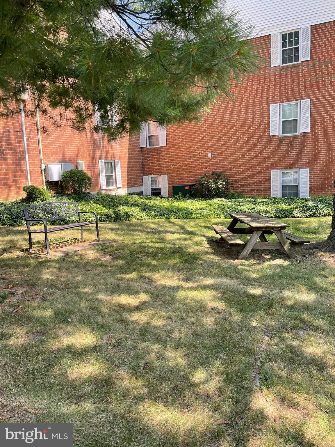 804 South Avenue, Unit D7 Secane, PA 19018 - Photo 5 of 33 a front view of a house with a yard