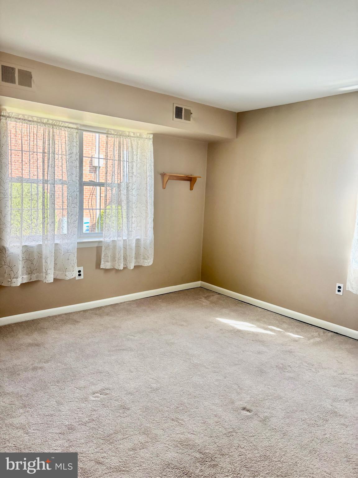 804 South Avenue, Unit D7 Secane, PA 19018 - Photo 7 of 35 a view of an empty room with a window