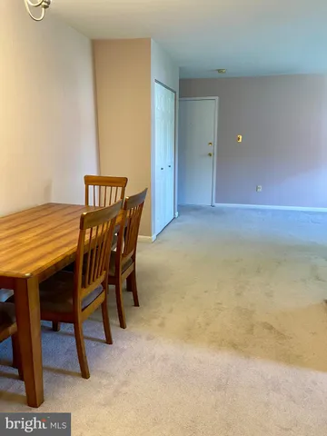 a balcony with two chairs