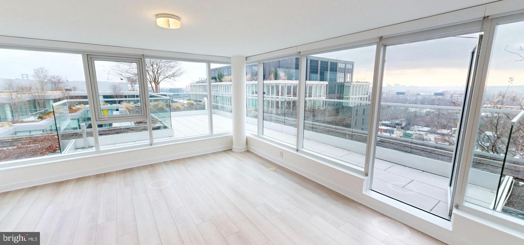 1201 Half Street Southwest, Unit PH1201 Washington, DC 20003 - Photo 15 of 26 a view of a room with window