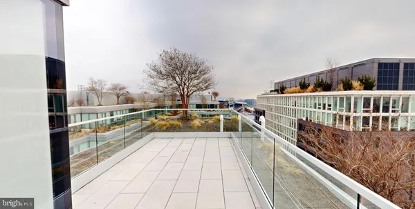 a view of a balcony with city view