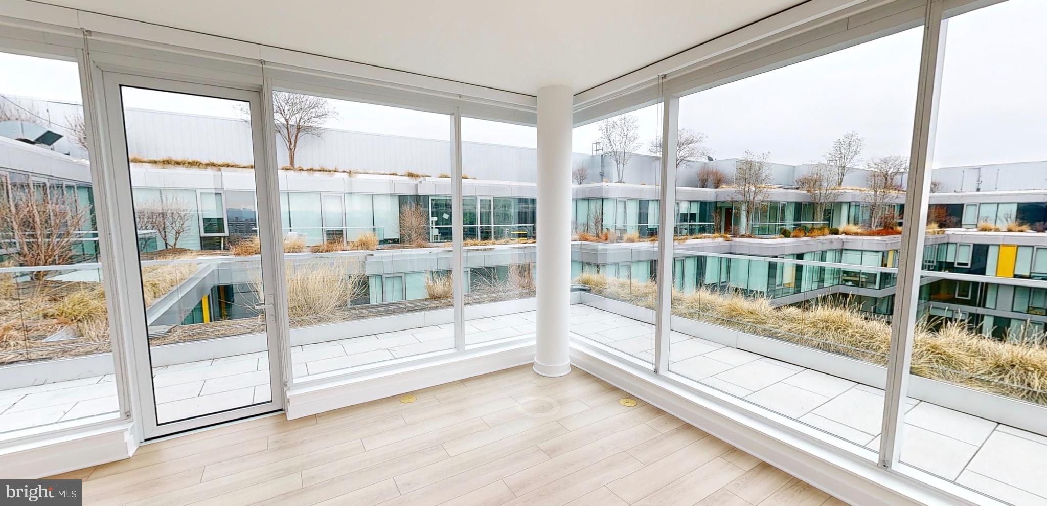 1201 Half Street Southwest, Unit PH1201 Washington, DC 20003 - Photo 7 of 26 a view of a room with window