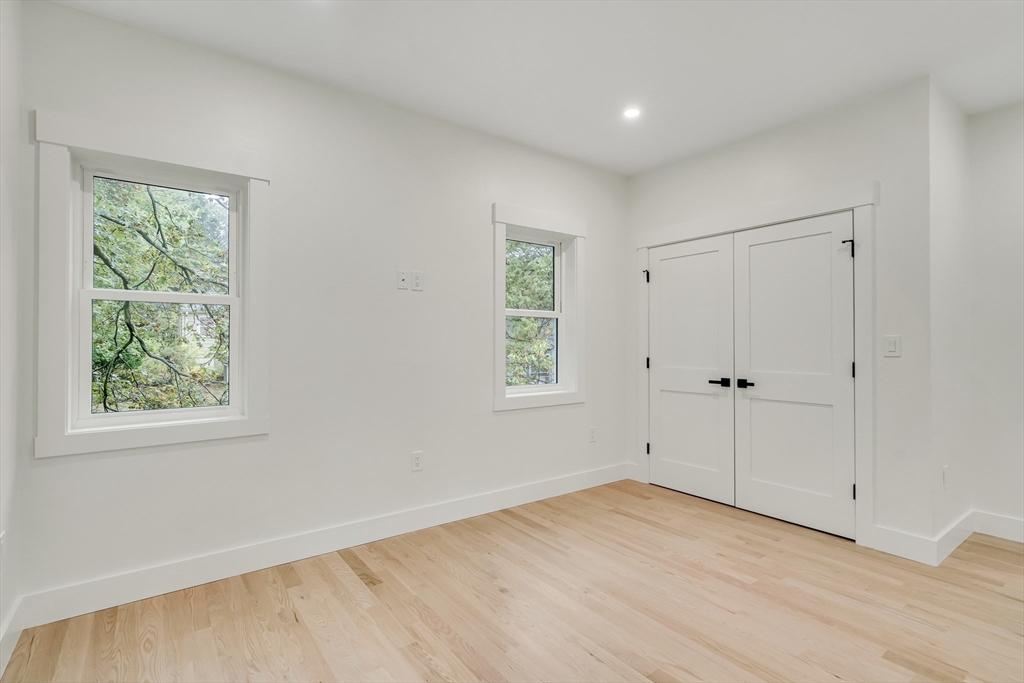 22 Estabrook Road Lexington, MA 02421 - Photo 27 of 35 a view of an empty room with a window