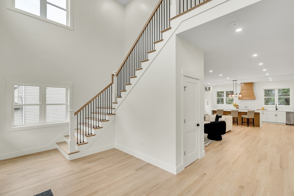 22 Estabrook Road Lexington, MA 02421 - Photo 7 of 35 a view of entryway and hall with wooden floor