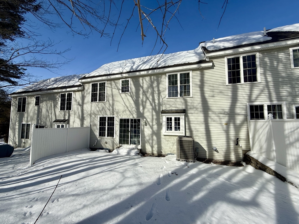 63 Providence Road, Unit 2 Grafton, MA 01519 - Photo 9 of 9 a front view of a house with a porch