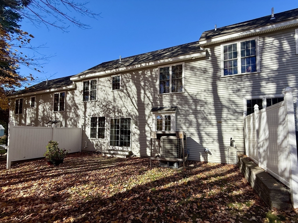 63 Providence Road, Unit 2 Grafton, MA 01519 - Photo 9 of 9 a view of a house with a street