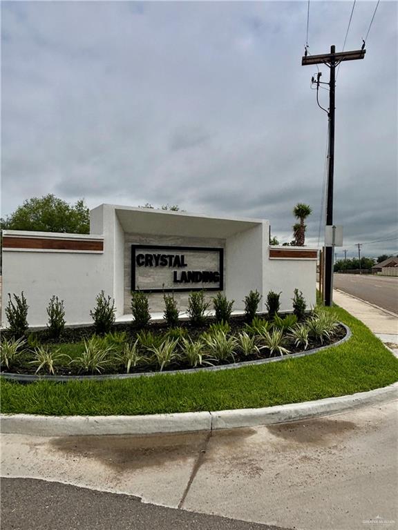 4 Estevan Street Mission, TX 78573 - Photo 21 of 24 a front view of a house with a yard and potted plants