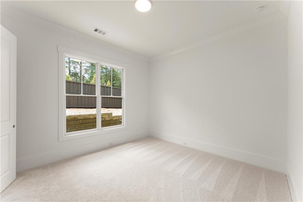 285 Reese Way Ball Ground, GA 30107 - Photo 19 of 30 an empty room with a window