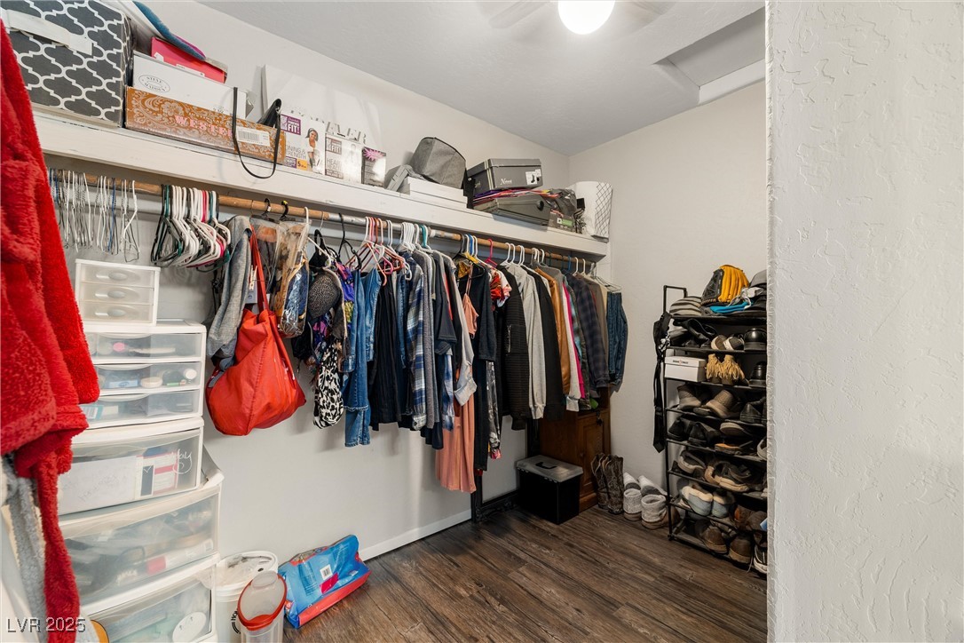 3951 West Blosser Ranch Road Pahrump, NV 89060 - Photo 24 of 35 Walk in closet with wood finished floors and lofted ceiling