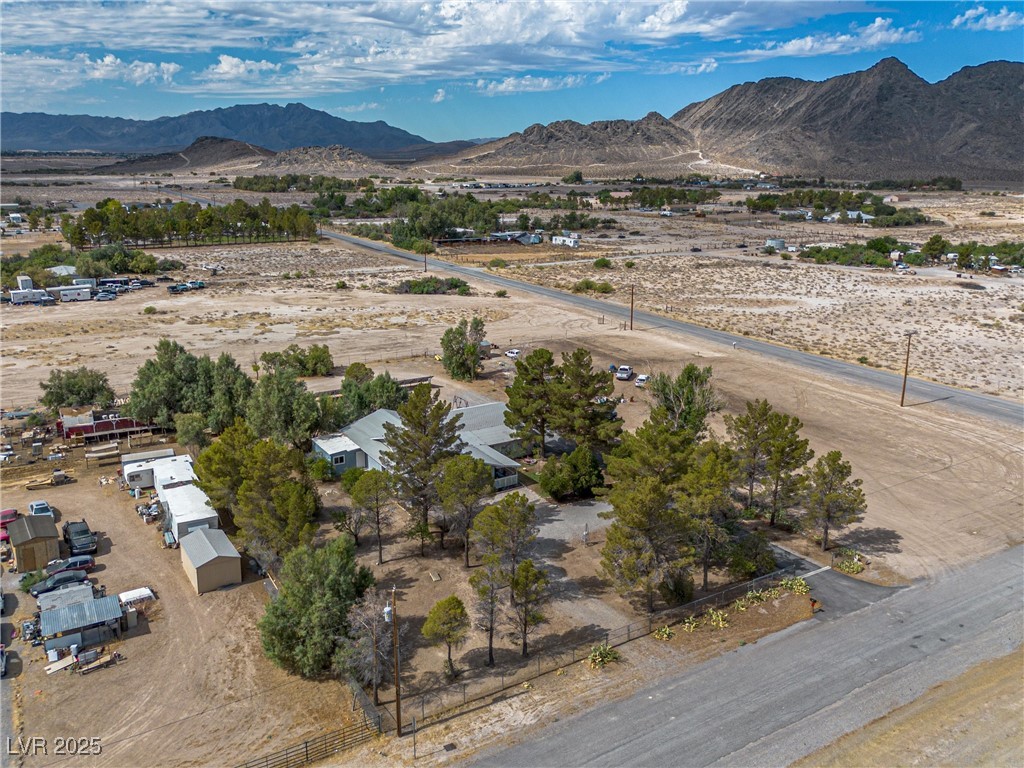 3951 West Blosser Ranch Road Pahrump, NV 89060 - Photo 33 of 35 Overview of rural landscape featuring mountains and a desert landscape