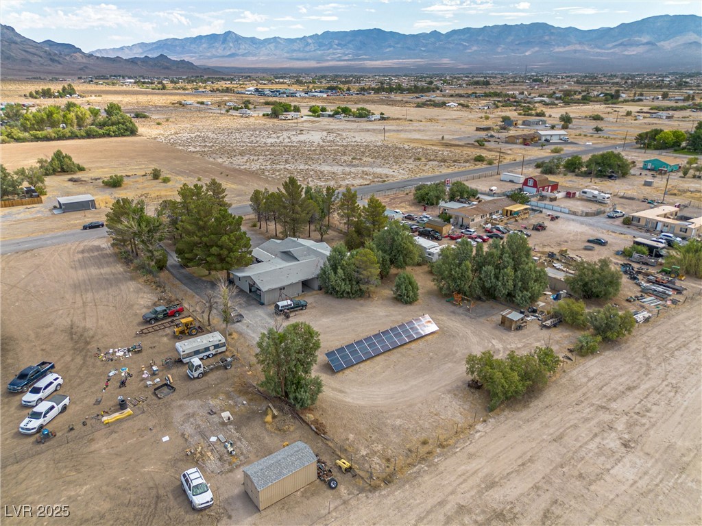 3951 West Blosser Ranch Road Pahrump, NV 89060 - Photo 34 of 35 Overview of rural landscape featuring a mountainous background and a desert landscape