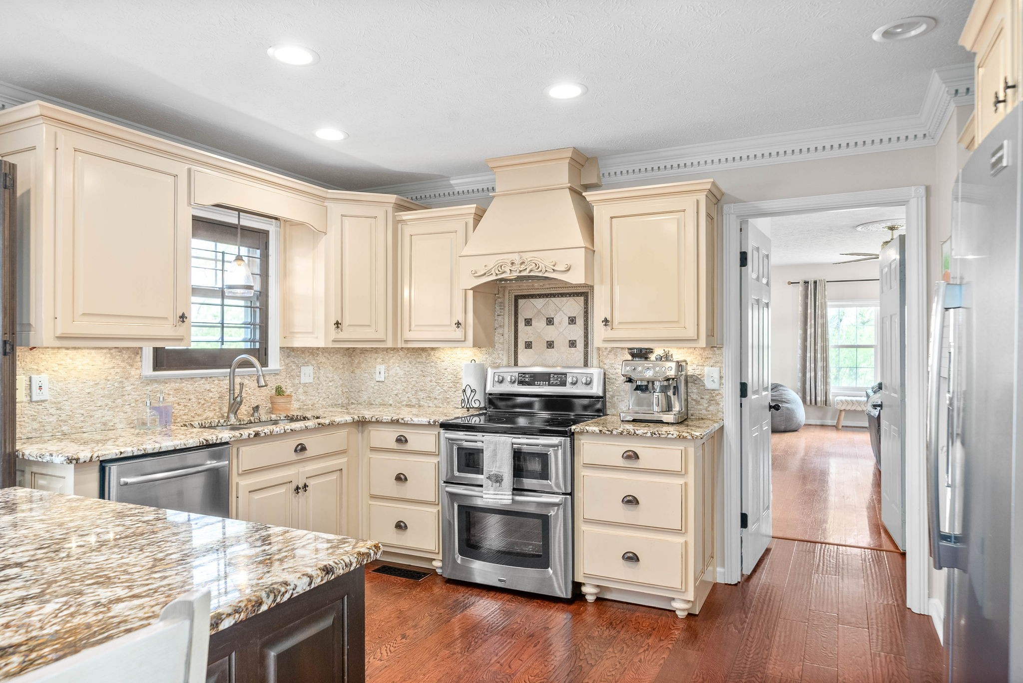 358 Ranch Road Portland, TN 37148 - Photo 11 of 43 a kitchen with stainless steel appliances a stove sink and cabinets