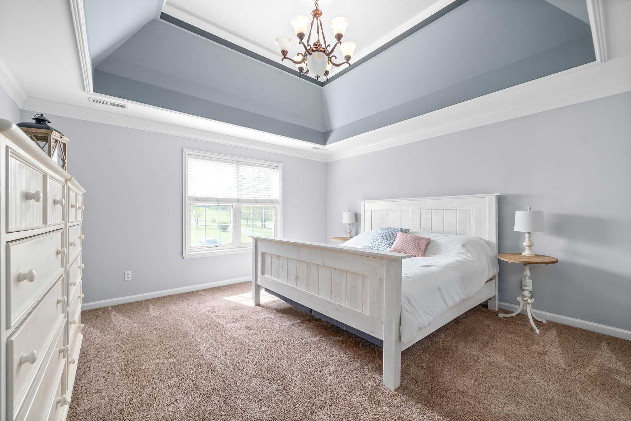 358 Ranch Road Portland, TN 37148 - Photo 20 of 43 a bed sitting in a spacious bedroom next to a window