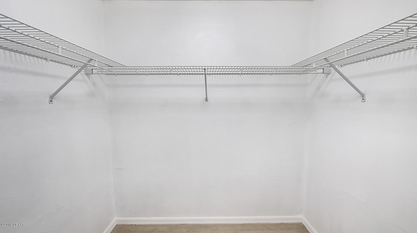 73 Glenview Avenue Ponce Inlet, FL 32127 - Photo 19 of 36 Master walk in closet