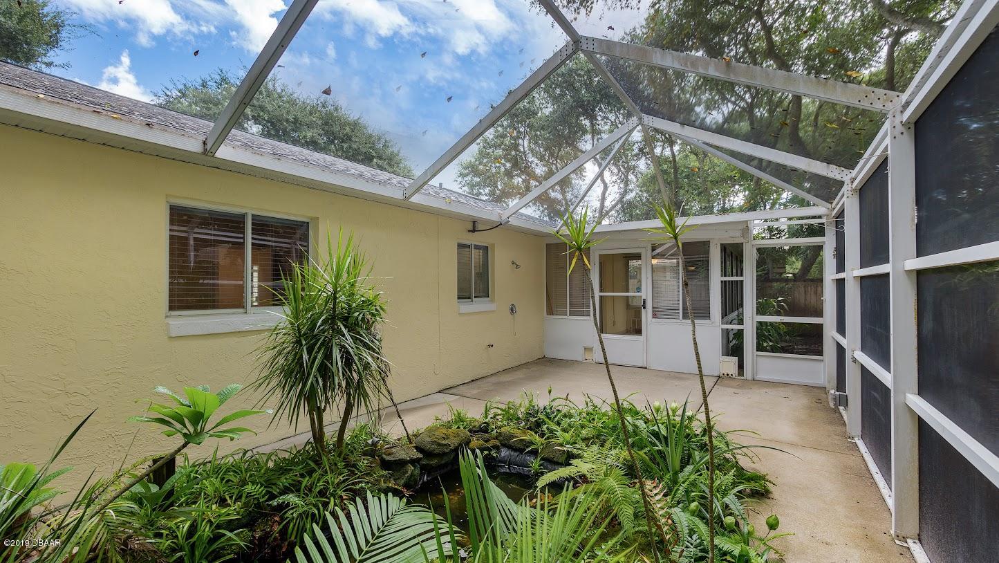 73 Glenview Avenue Ponce Inlet, FL 32127 - Photo 31 of 36 Screened Patio