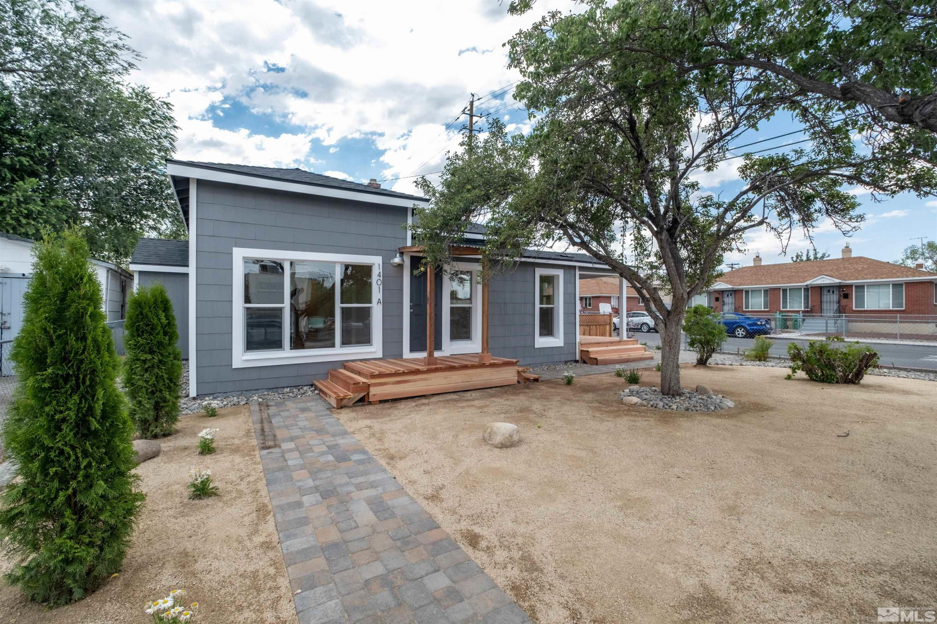 1401 Locust Street Reno, NV 89502 - Photo 1 of 29 a view of a house with backyard sitting area and garden