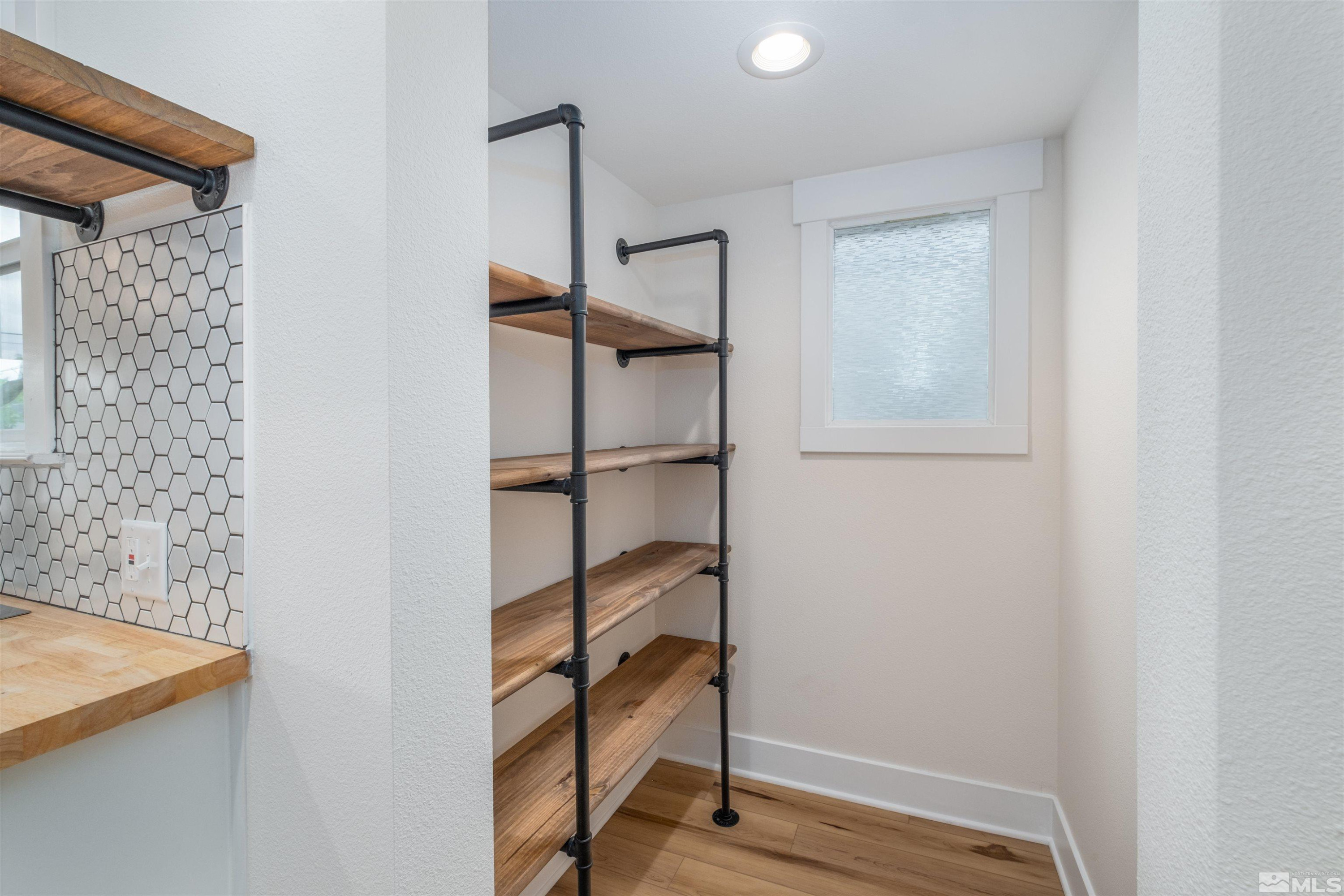 1401 Locust Street Reno, NV 89502 - Photo 15 of 29 a view of a room with racks on the wall