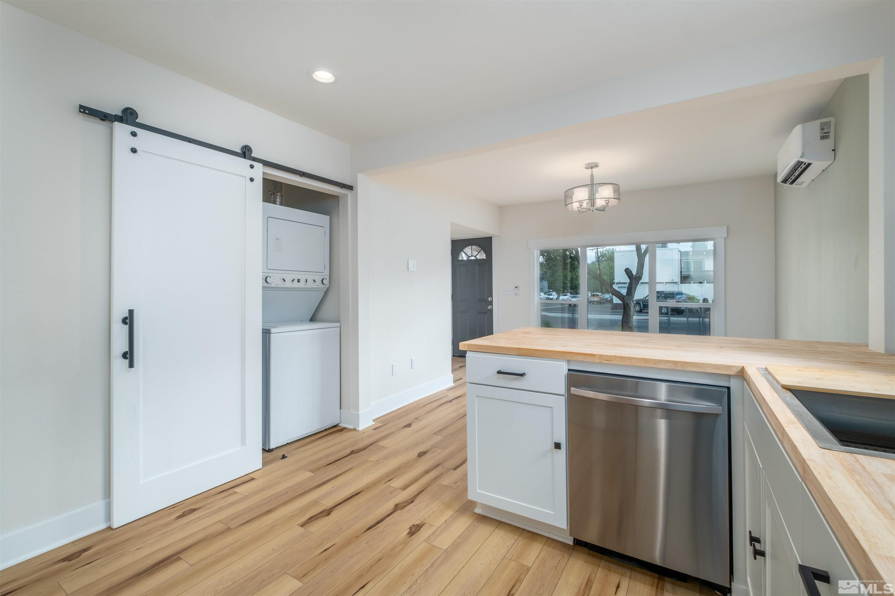 1401 Locust Street Reno, NV 89502 - Photo 16 of 29 a kitchen with a stove and a refrigerator