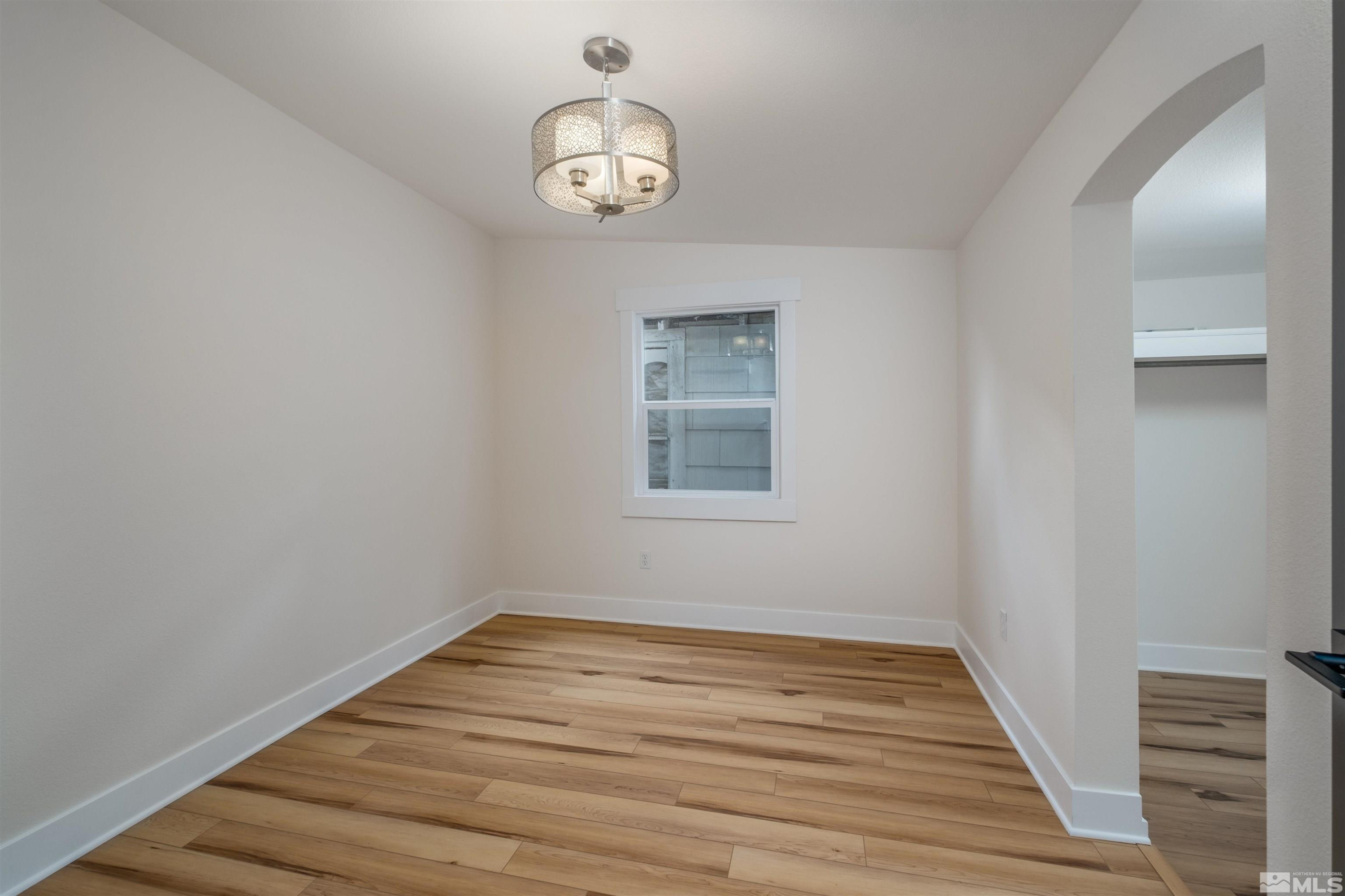 1401 Locust Street Reno, NV 89502 - Photo 18 of 29 a view of empty room with wooden floor