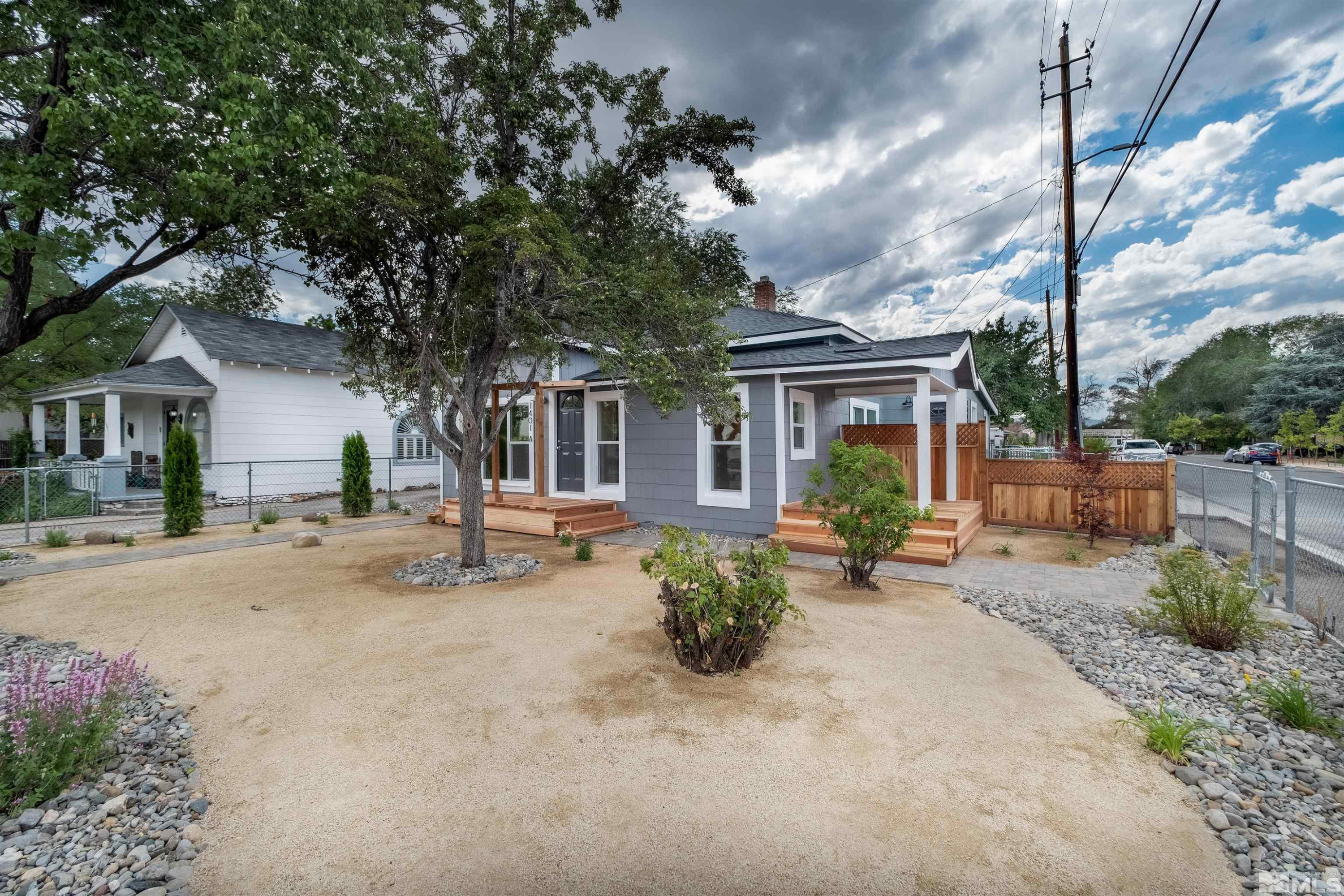 1401 Locust Street Reno, NV 89502 - Photo 2 of 29 a view of a house with backyard sitting area and porch