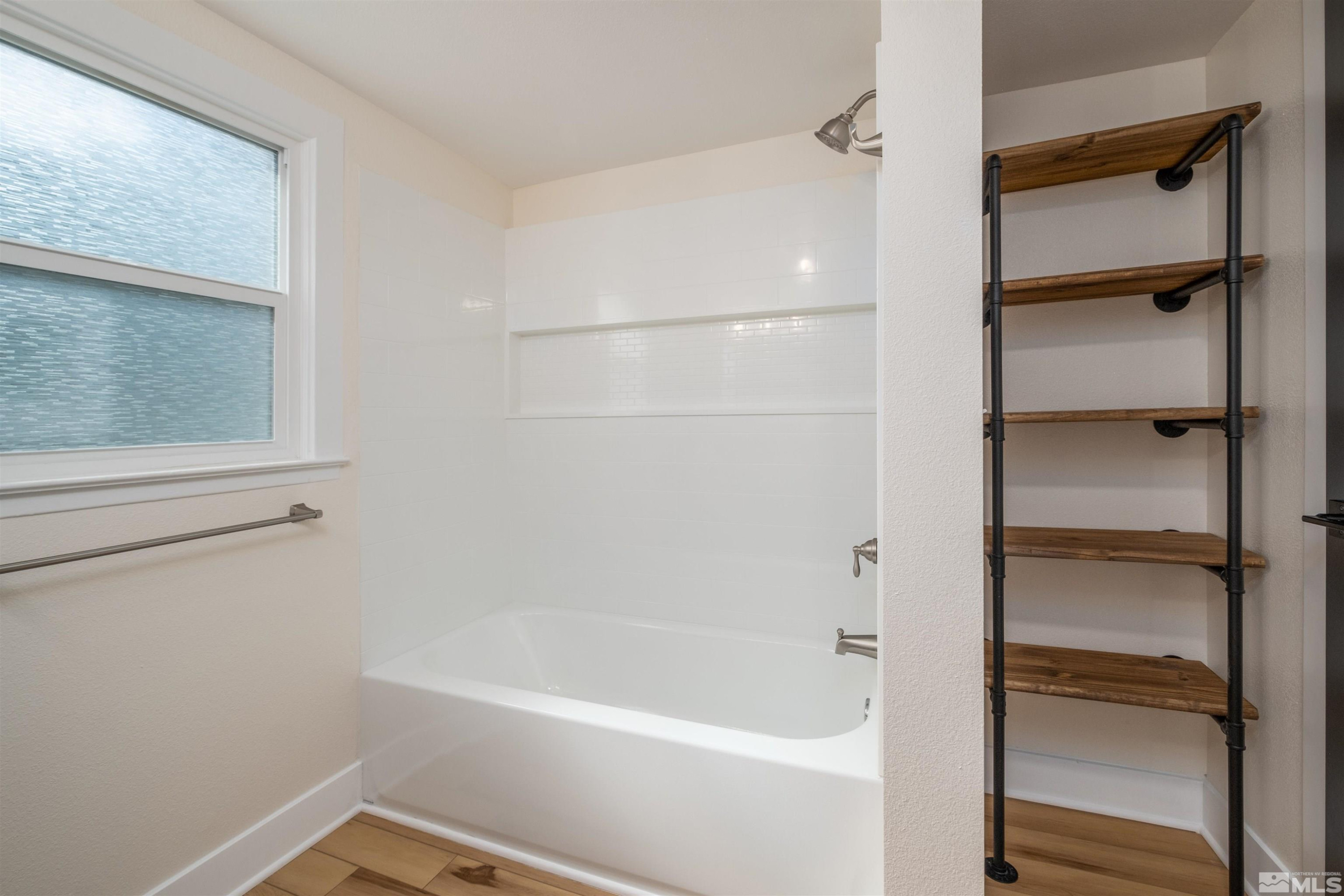 1401 Locust Street Reno, NV 89502 - Photo 21 of 29 a bathroom with a bathtub