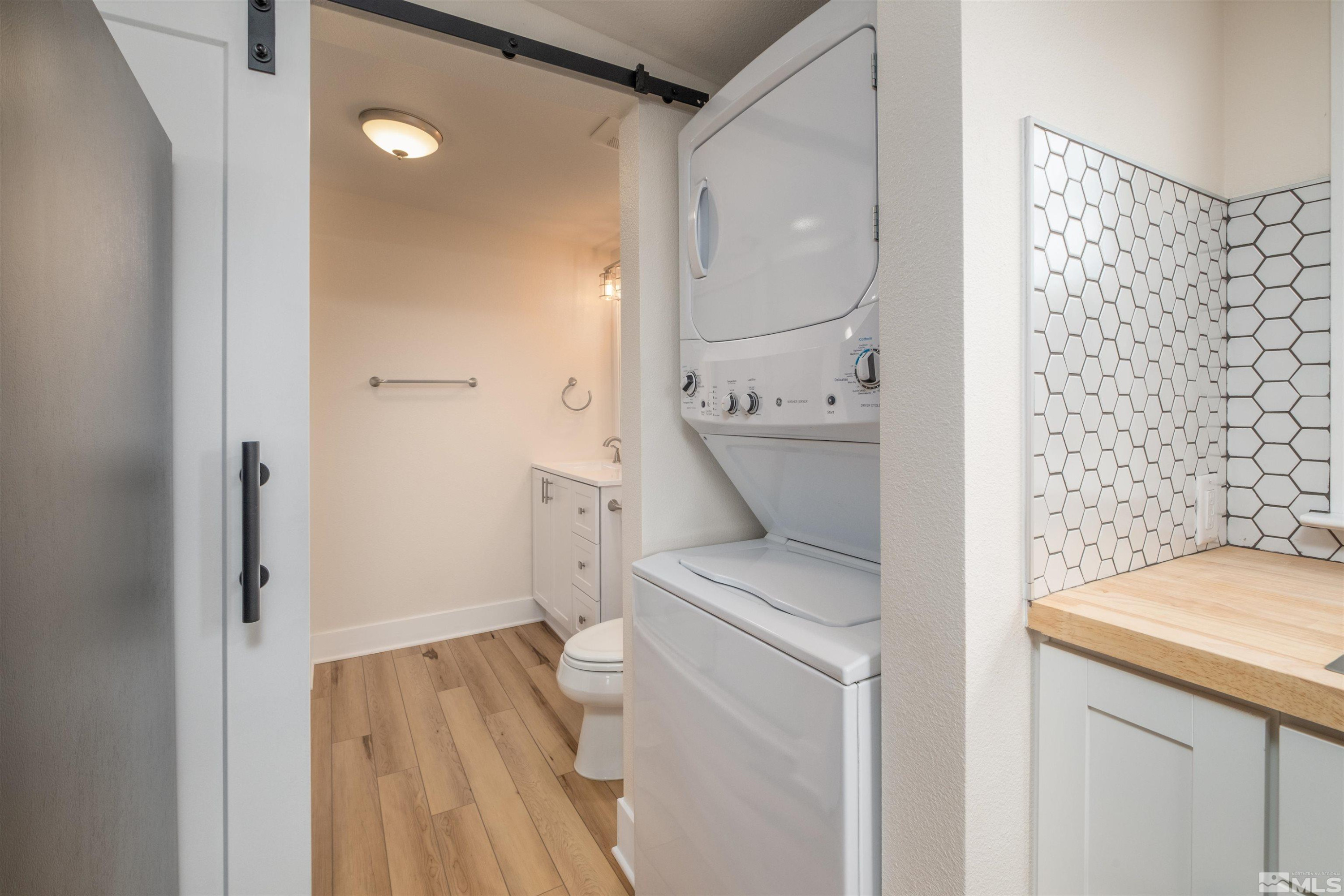 1401 Locust Street Reno, NV 89502 - Photo 26 of 29 a bathroom with a sink a toilet and shower
