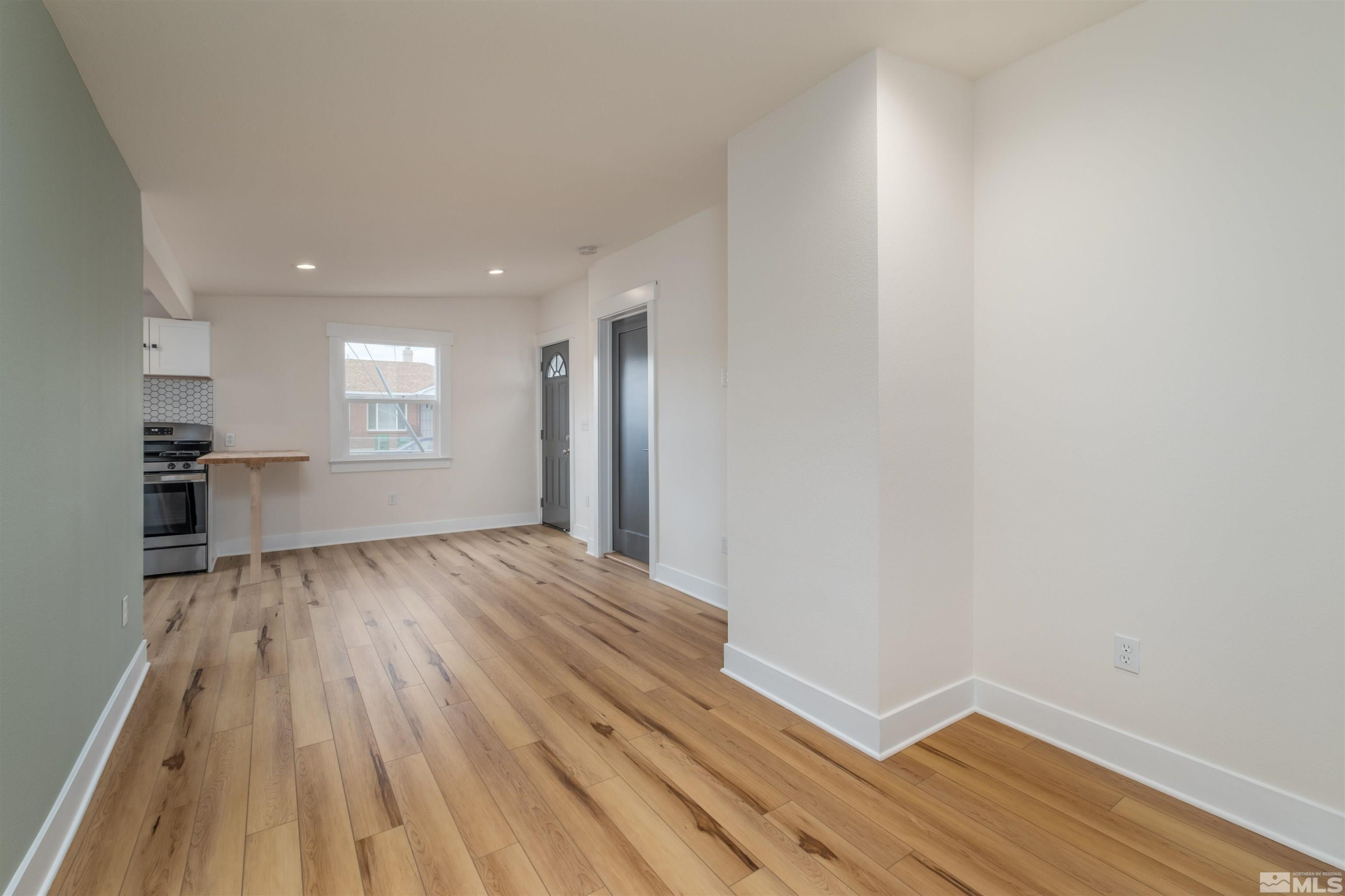 1401 Locust Street Reno, NV 89502 - Photo 28 of 29 a view of empty room with wooden floor and fan