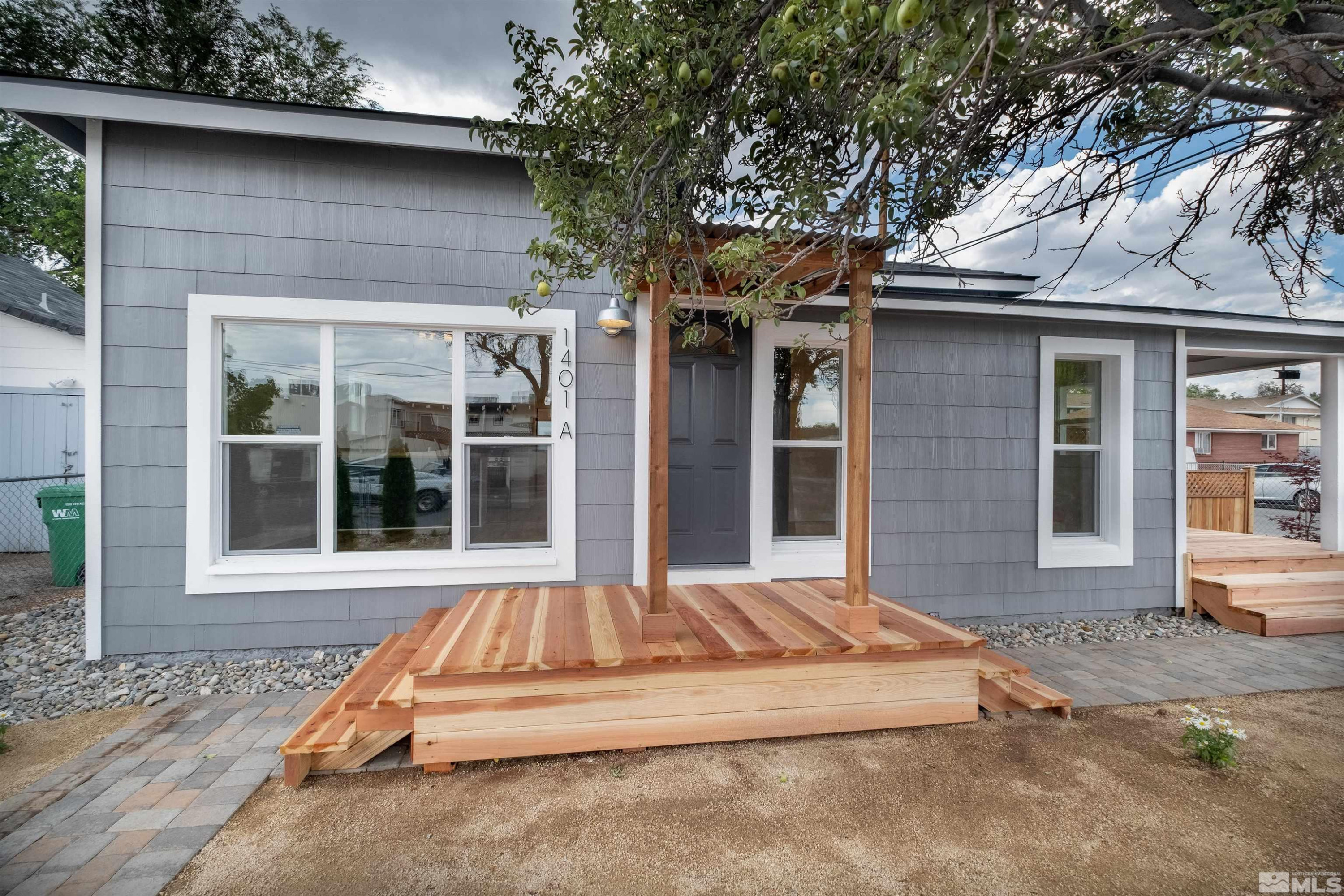 1401 Locust Street Reno, NV 89502 - Photo 6 of 29 a view of brick house with large windows