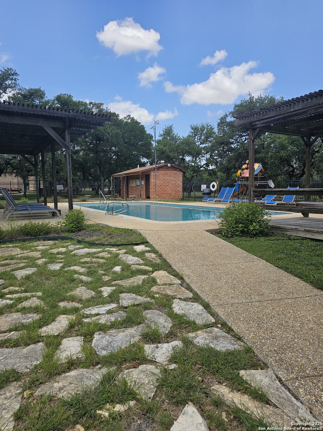 628 Winding River Lane Spring Branch, TX 78070 - Photo 11 of 16 a view of a house with a yard