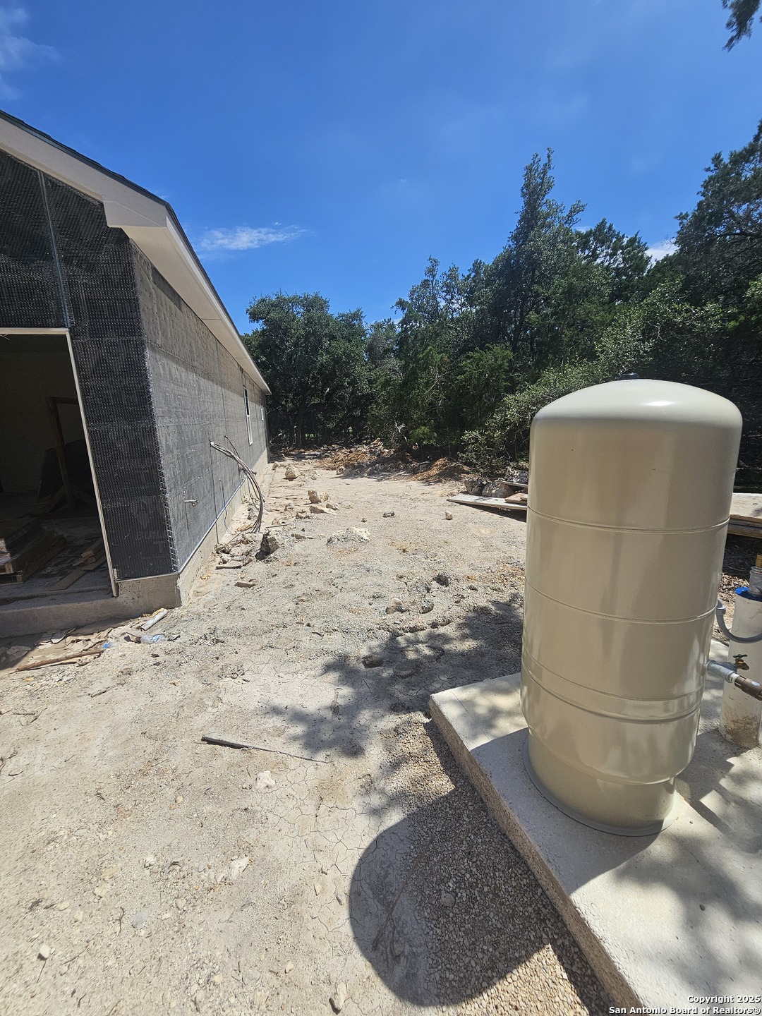 628 Winding River Lane Spring Branch, TX 78070 - Photo 6 of 16 a view of a backyard of the house