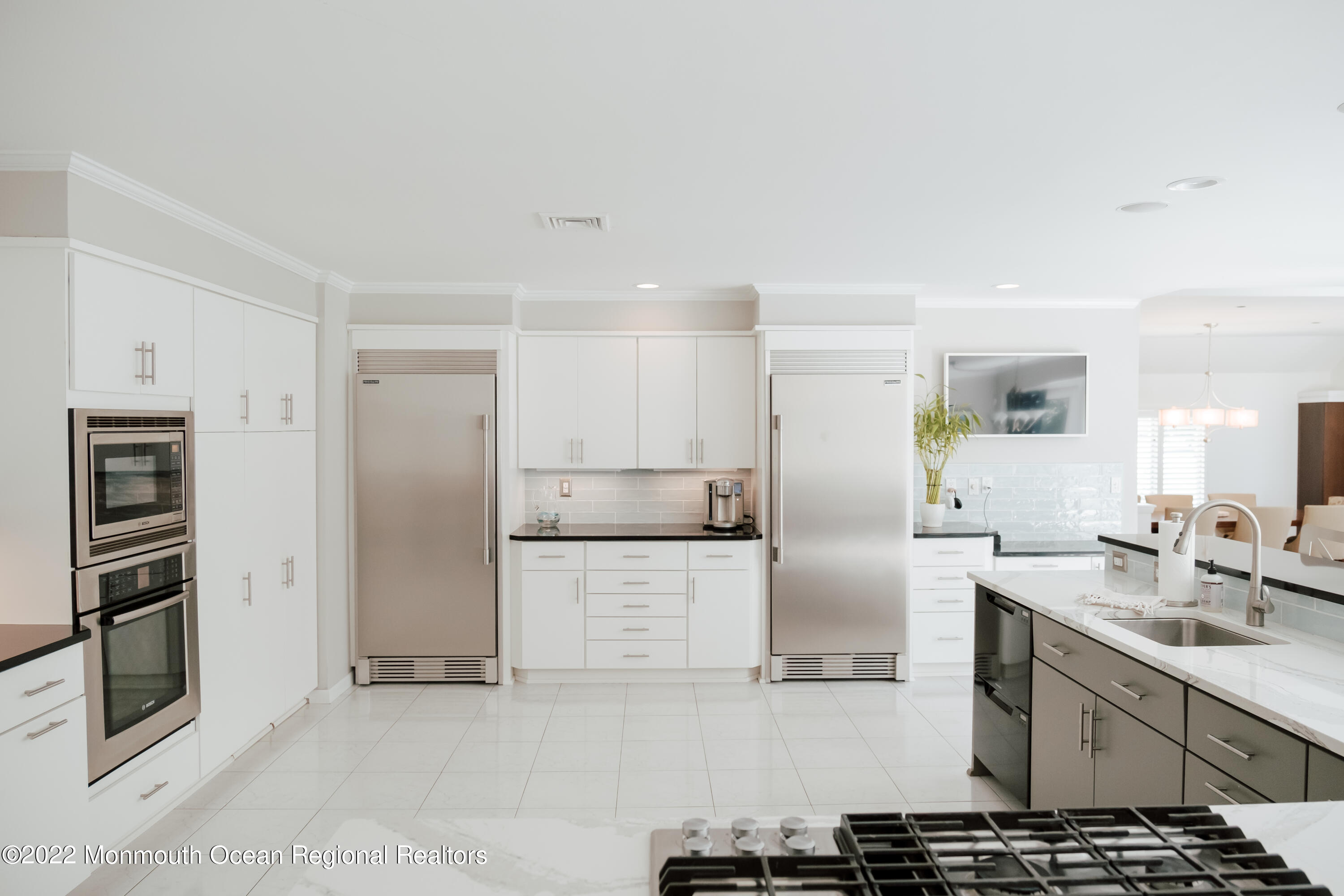 97 Mitchell Place Little Silver, NJ 07739 - Photo 17 of 21 a kitchen with refrigerator and cabinets
