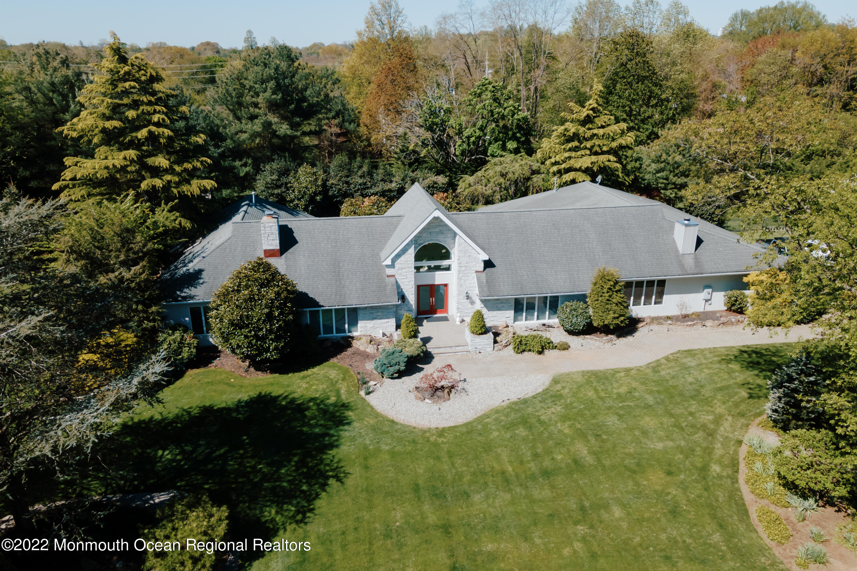 97 Mitchell Place Little Silver, NJ 07739 - Photo 2 of 21 a aerial view of a house with table and chairs